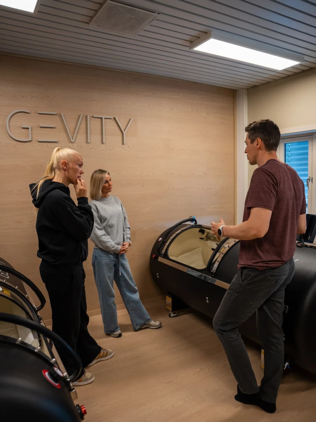 Visitors are introduced to Gevity's hyperbaric chamber